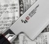 Mcusta Zanmai Revolution Nóż Santoku 15cm
